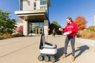 University of Wisconsin student with robot 